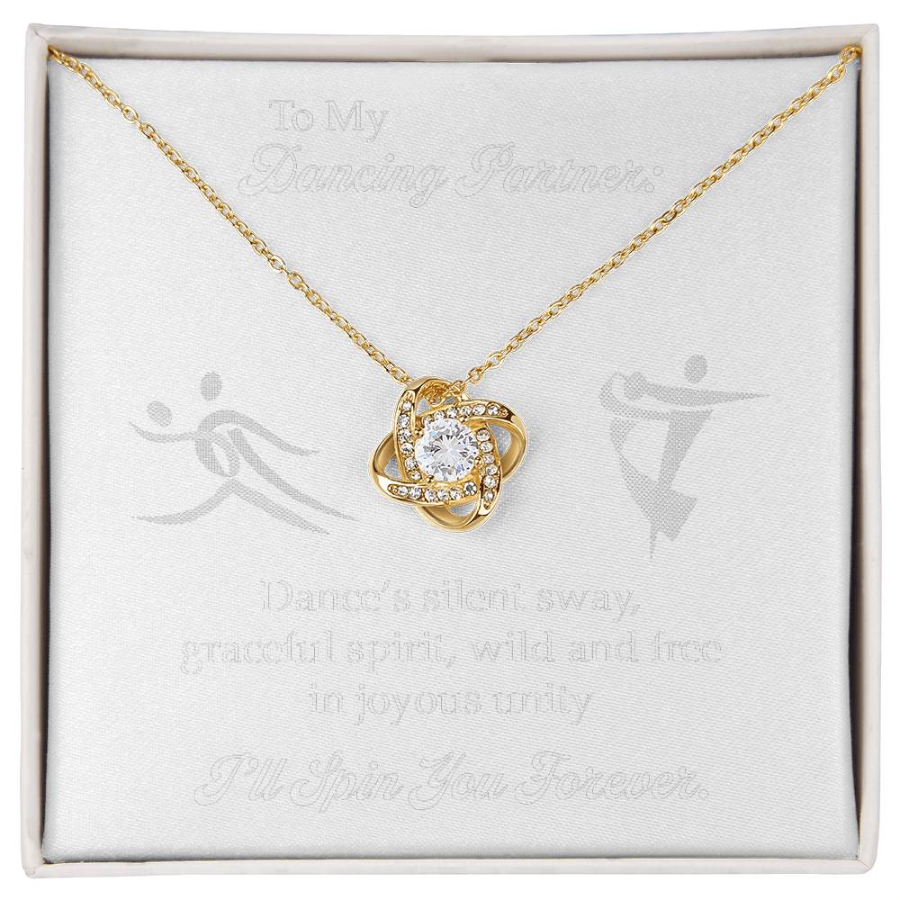 "Dancing Partner" My Dancing Queen in her Love Knot necklace. Gold and Silver variants.